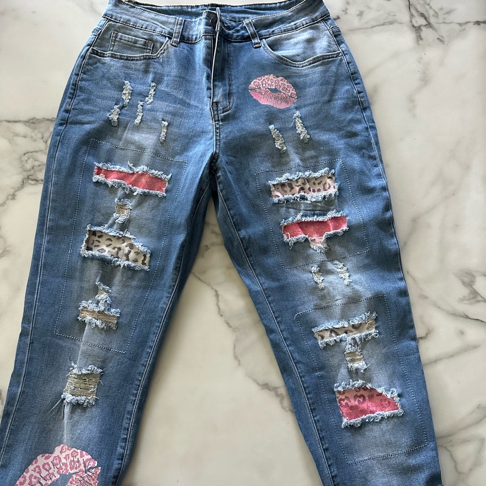 Pink leapard jeans size 14 new